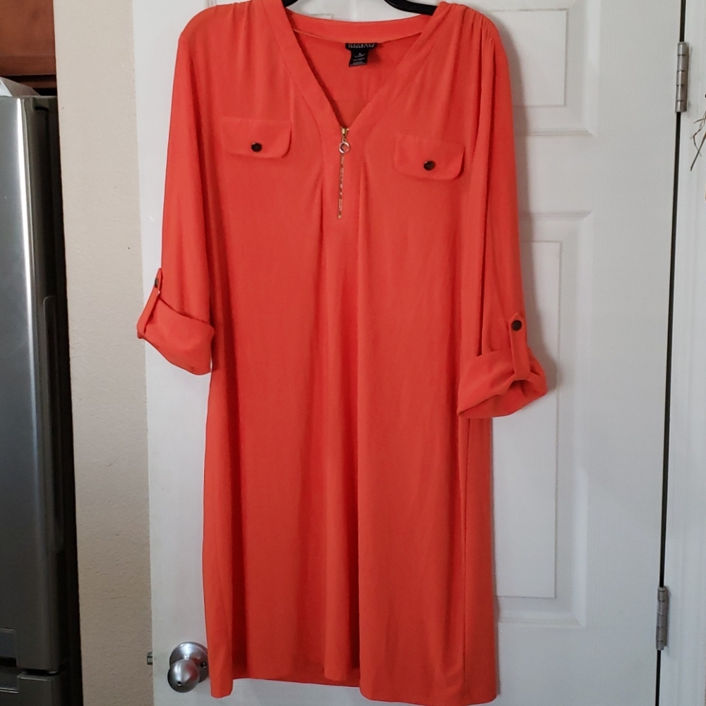 Orange stretchy dress.